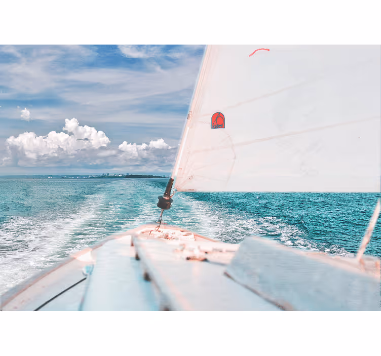 Wall mural blue boat in the sea with white clouds - TenStickers