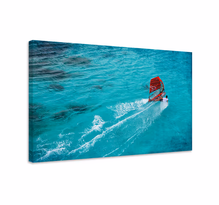 Blue canvas print windsurfer in the water - TenStickers