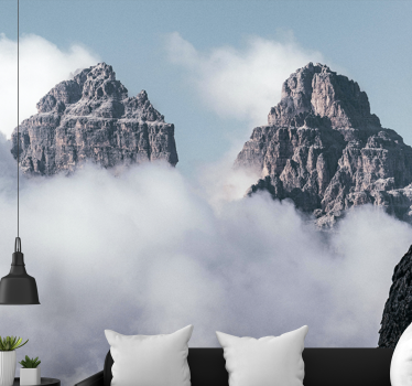 Wall mural mountain majestic peaks above clouds - TenStickers